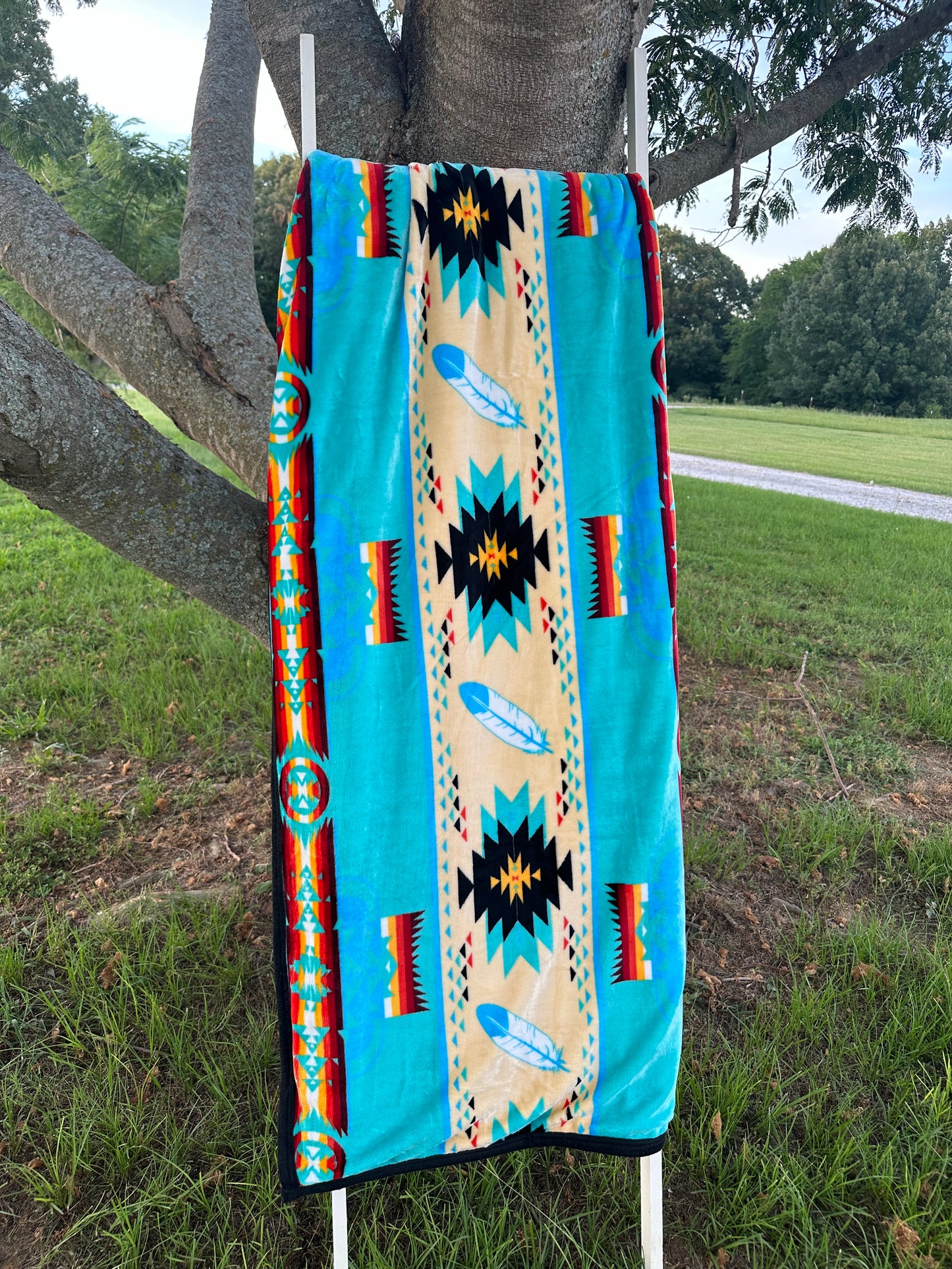 King size turquoise feather blanket